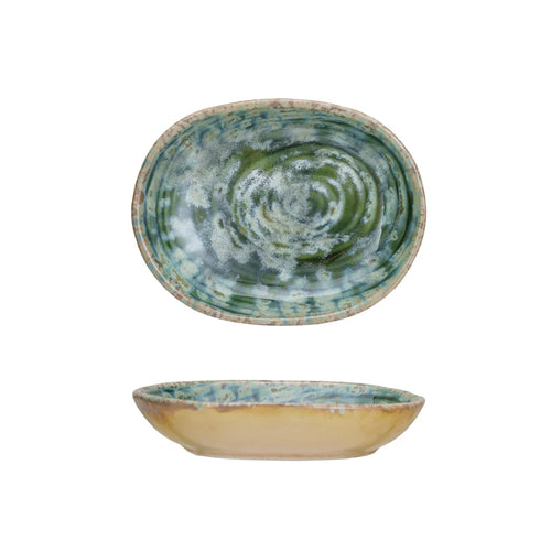 Embossed stoneware dish with a green glazed finish. 