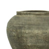 Texturized and worn black clay vase pot. 