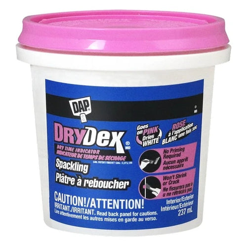 DAP Drydex Spackling for interior and exterior. Goes on pink dries white.