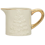 Cream coloured embossed tree stoneware creamer with gold handle and trim. 