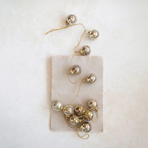 Antique gold etched mercury glass ball ornament garland string with gold cord. 