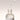 Skincare dropper bottle with droplet of liquid on a neutral background, featuring 'Beauty from Bees' brand.