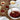 Strawberry Rhubarb Preserves being prepared and added into pie crusts.