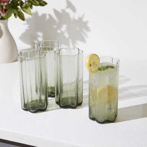 Vintage inspired smoked green water glasses filled with fresh lemonade. 