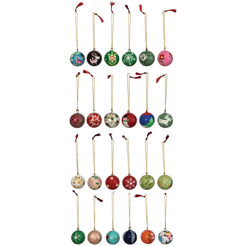 Painted 1-inch round ball ornaments with gold hangers and  red tassel ends.