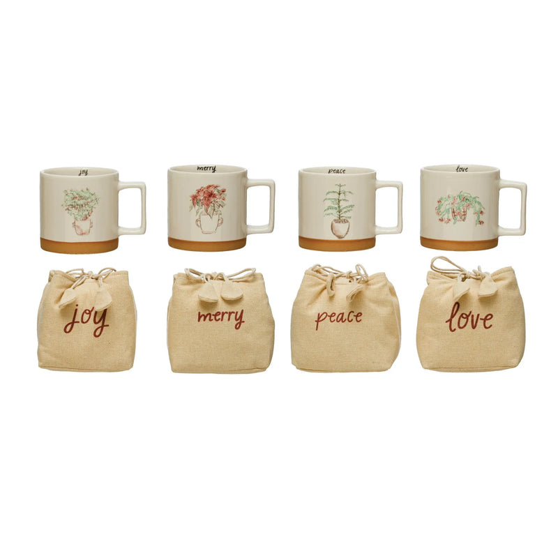 Beautiful stoneware holiday inspired mugs with muslin bags for gifting.