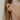 Model wearing JaxKelly minimalist horseshoe shaped earring