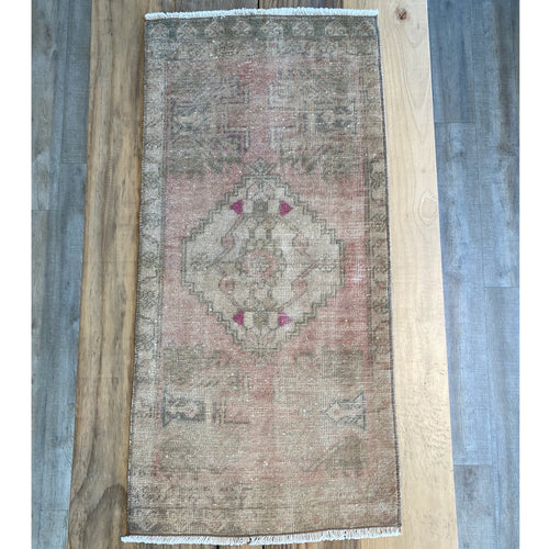 Turkish rug with Pale green, pale pink and beige with hints of hot pink