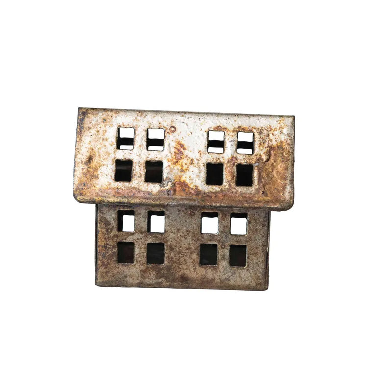 Small antique metal house with windows and cut outs. 
