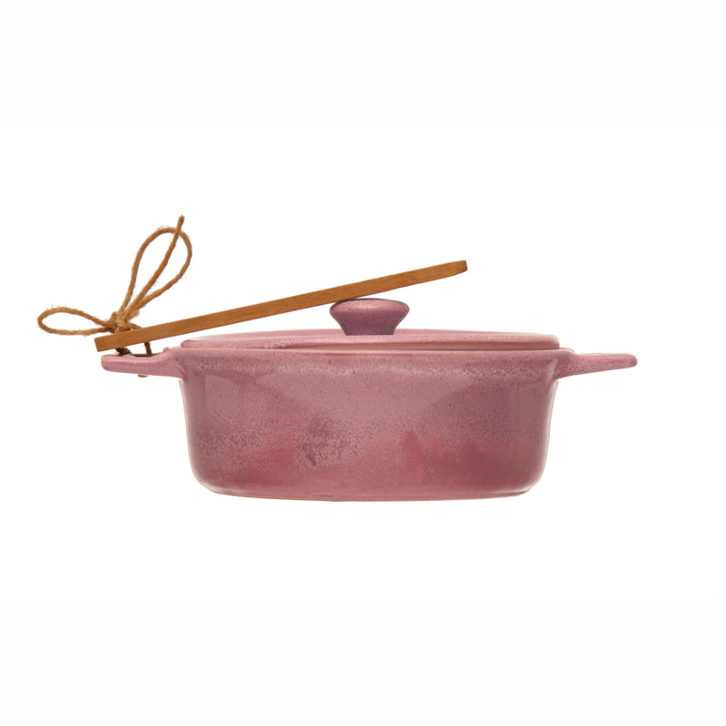 Pink stoneware brie baker that comes with a bamboo spreader.