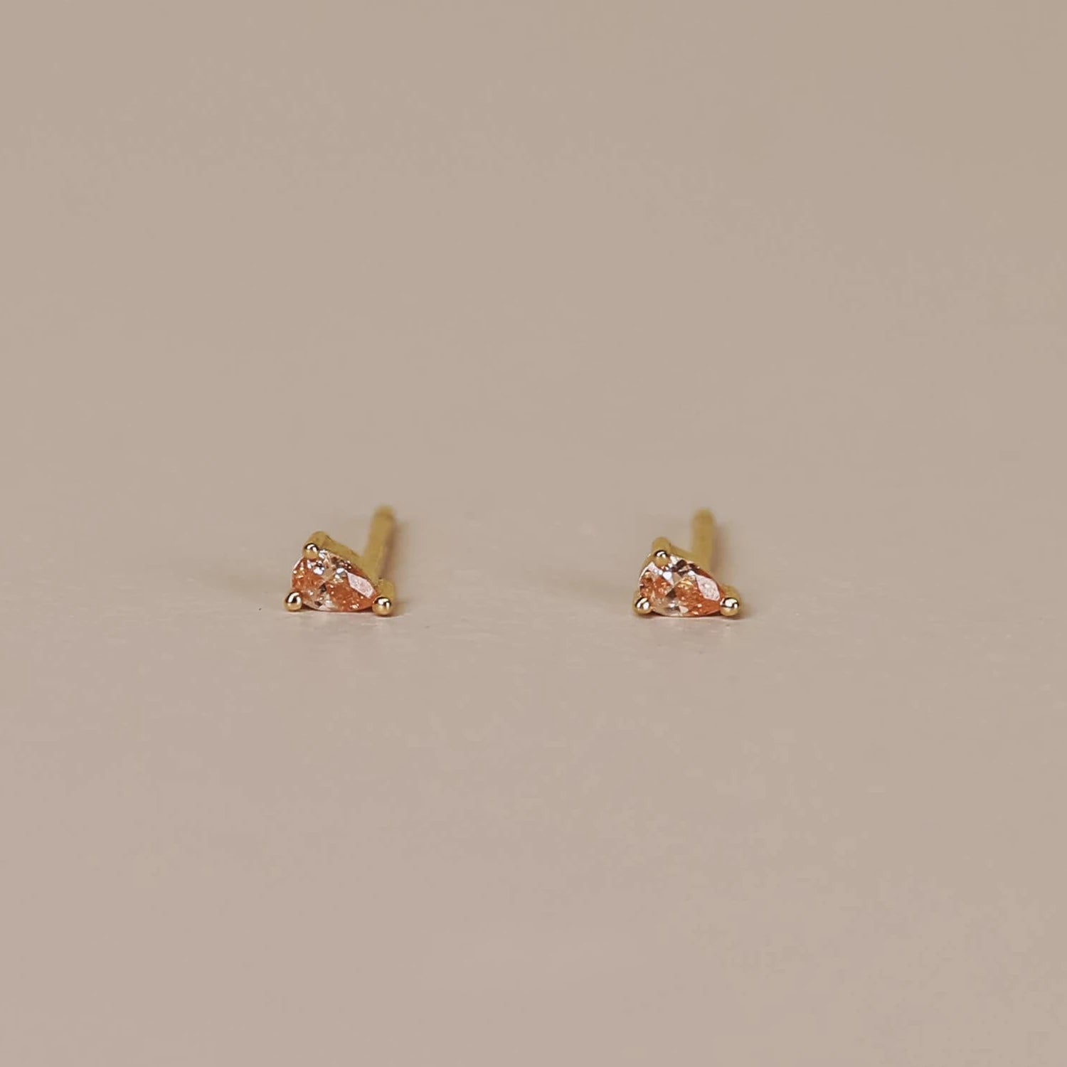 Teadrop champagne colored stud earring. 