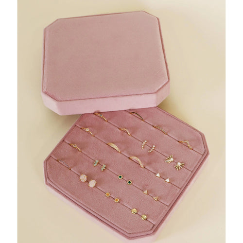 Pink velvet square jewelry box.