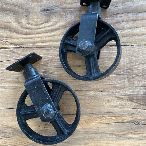 Black iron caster wheels for furniture.