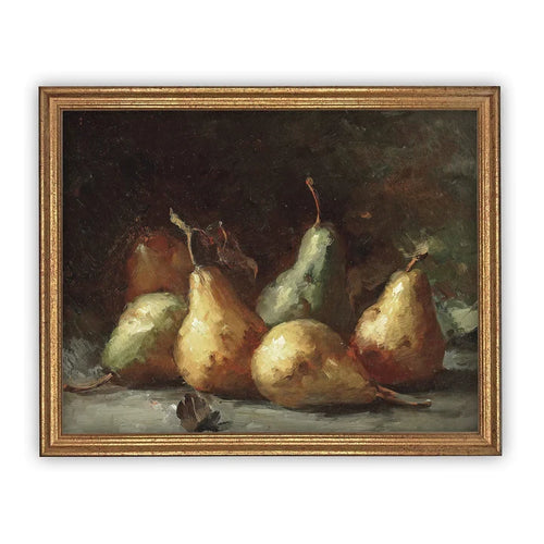 Vintage farmhouse artwork in a gold frame featuring green and yellow pears, with a dark textured background. 