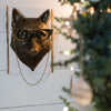 Eloise the fox wall mount near a Christmas tree. 