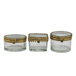 Set of 3 beveled glass and brass boxes. 